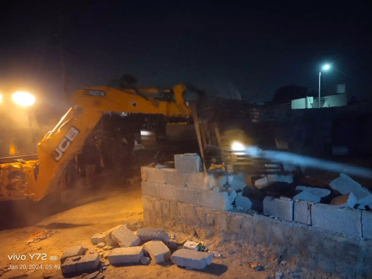 GHMC bulldozed 15 unauthorised constructions built on government land