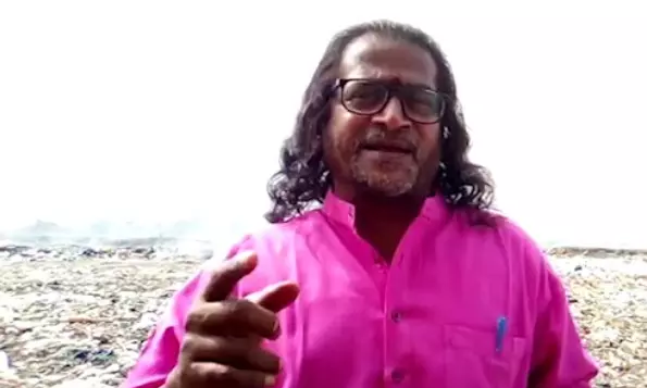 Dusarlpaudi Ramana Raju observes relay fast with National Flag