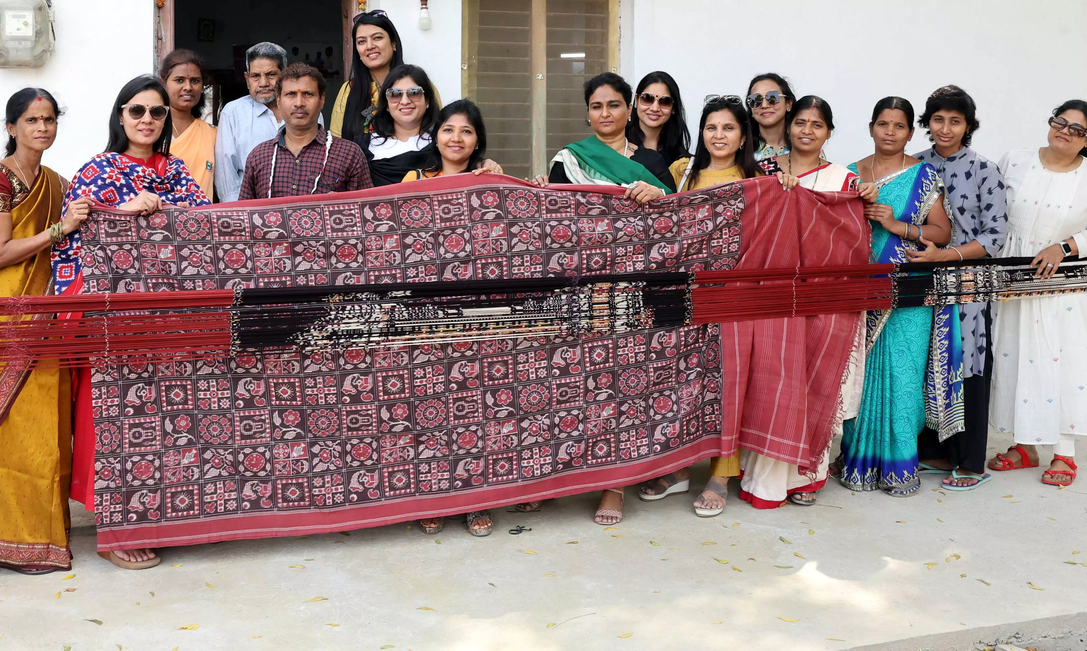 FLO members interact with weavers of dying art Telia Rumal of Puttapaka