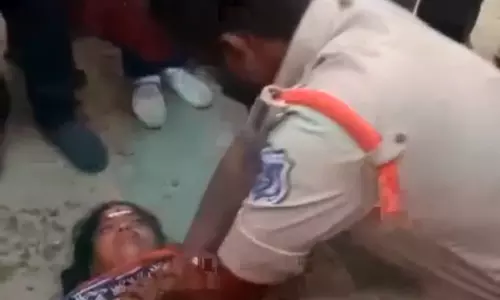 Cop Gives CPR to Save Womans Life