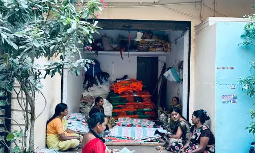 Polls Bring in Extra Income to Women Flag Makers