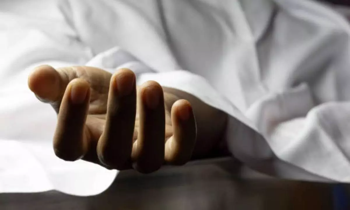 Chirala: Dead body found in sand dump Chirala: Dead body found in sand dump