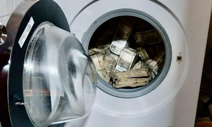 ED Officials During a Raid Seized Rs 2.54 Crore That Was Concealed in a Washing Machine.