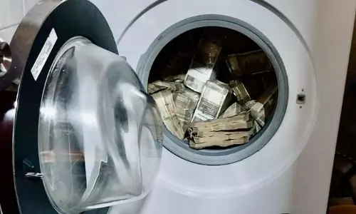 ED Officials During a Raid Seized Rs 2.54 Crore That Was Concealed in a Washing Machine.