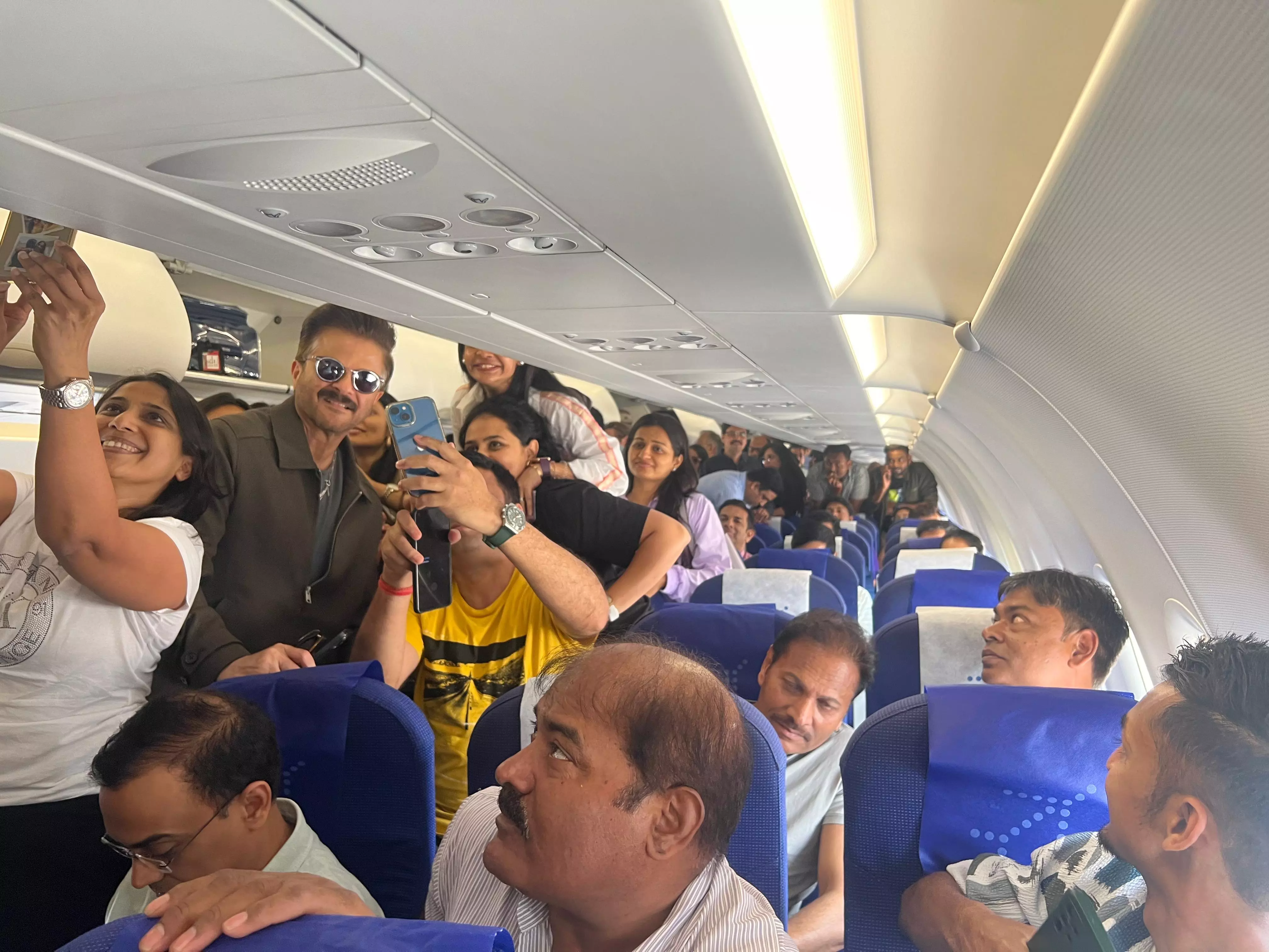Fans Queue Up for Selfies with Anil Kapoor on Plane Fans Queue Up for Selfies with Anil Kapoor on Plane