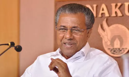 Don’t scare us with jail Kerala CM Pinarayi Vijayan tells Rahul Gandhi