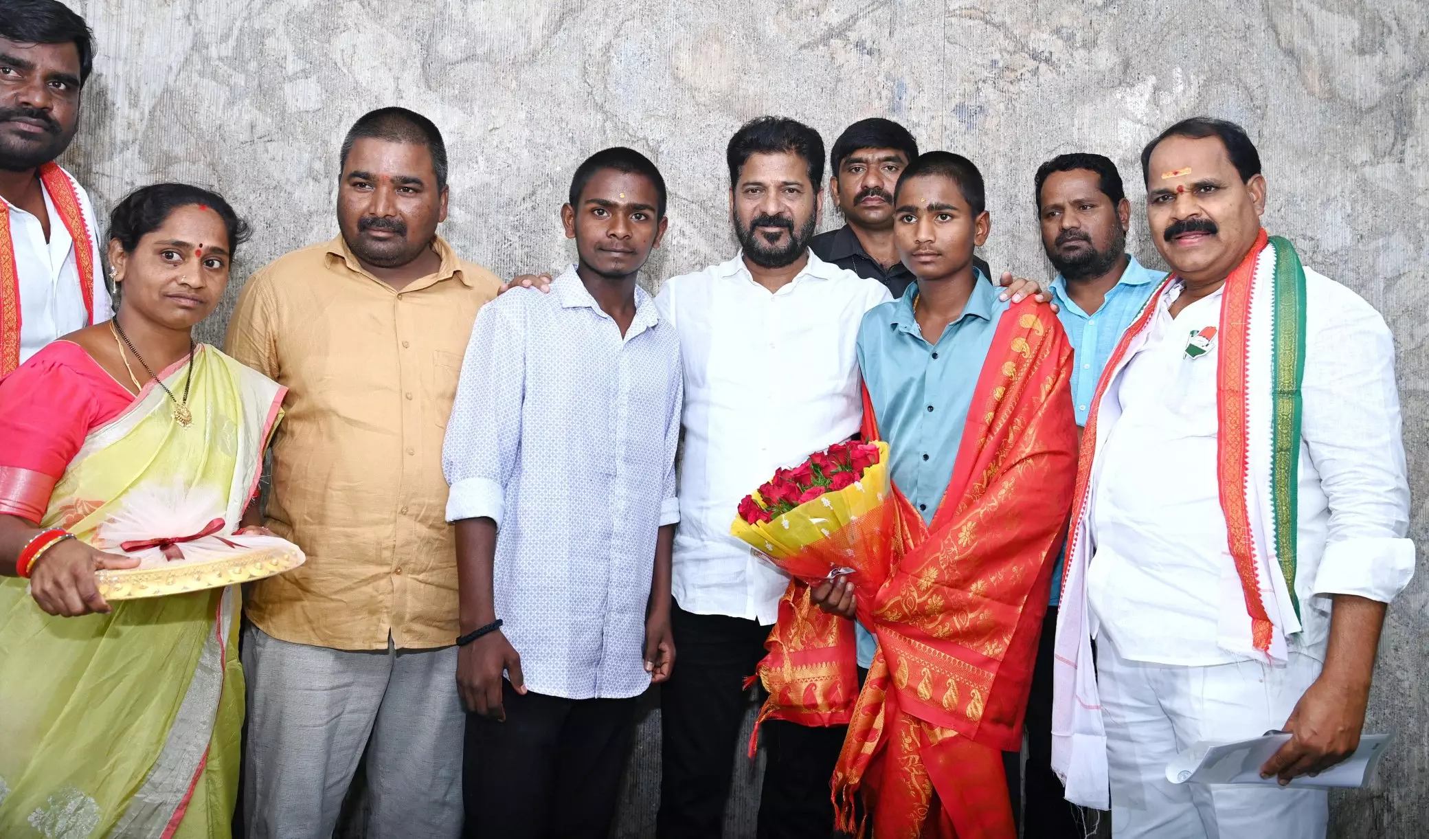 Revanth Felicitates 15-Year Old Sai Charan Who Saved Lives in Shadnagar Fire Accident