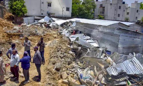 When I opened my eyes, three of the family were crushed under debris, says eyewitness When I opened my eyes, three of the family were crushed under debris, says eyewitness