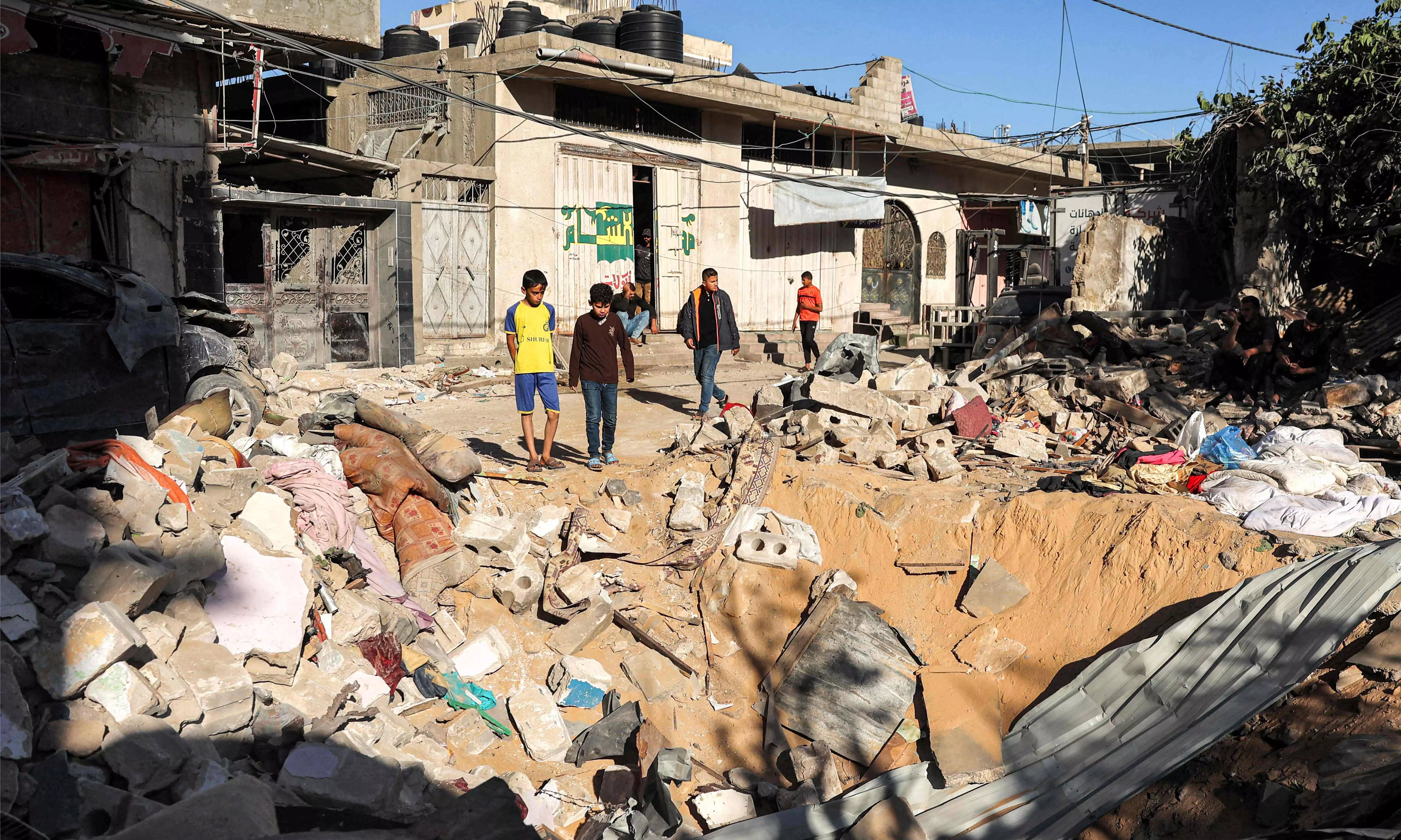 Israel shells Rafah as Biden vows arms suspension