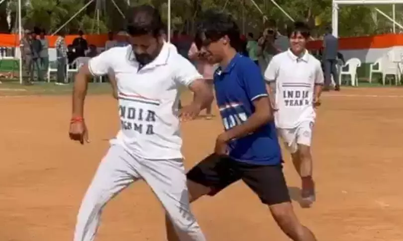 CM Revanth indulges in friendly football match with HCU students