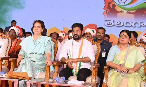 Be wary of BJPs AA tax, caution Priyanka, Revanth