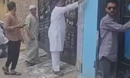 People knock on doors of voters in Hyderabad
