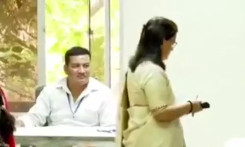 Chief Secretary carries mobile phone to booth, violates MCC