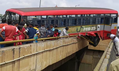 Narrow escape for passenger after bus suspends mid air on Bangalore flyover