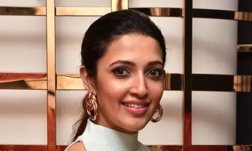 Glam girl Neha Shetty dons mother role