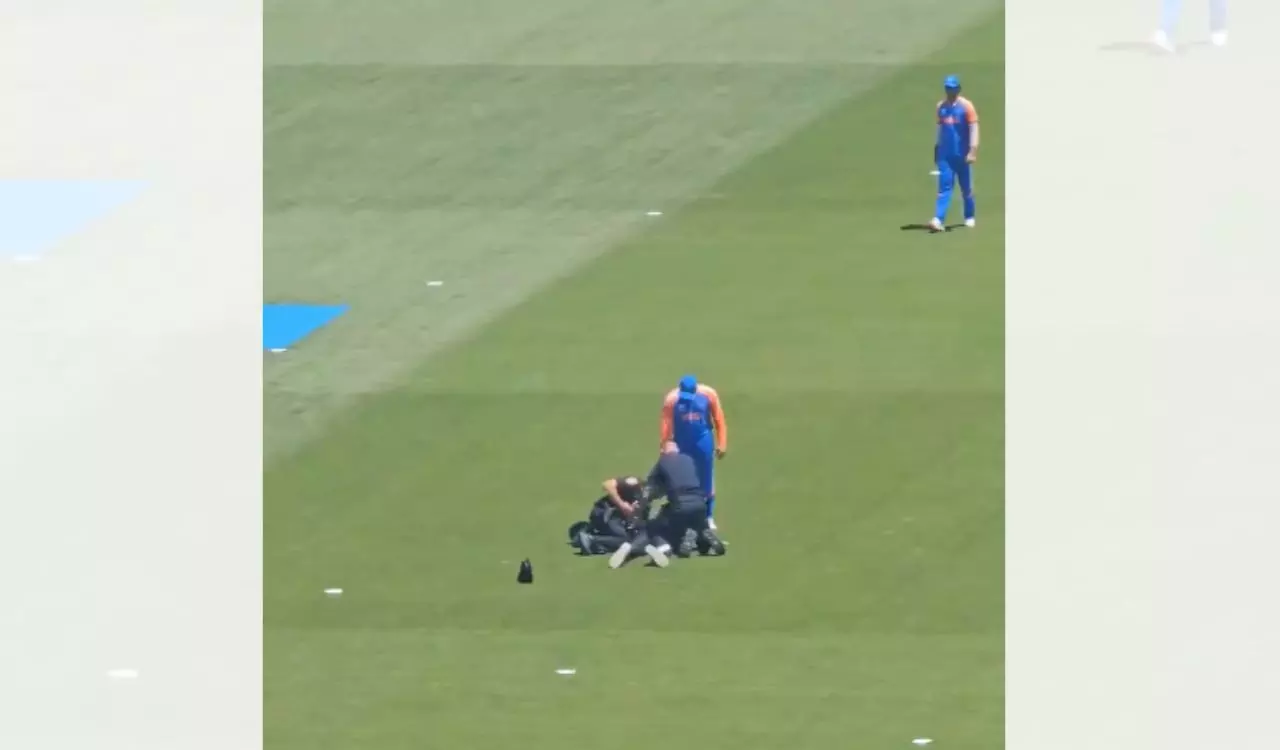 Watch: Fan breaches security to meet Rohit, NY police step-in Watch: Fan breaches security to meet Rohit, NY police step-in