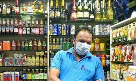 Staff at Government Liquor Shops Seek Job Security