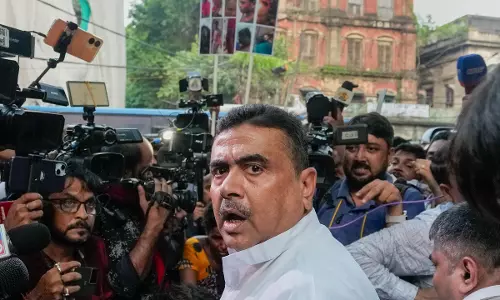 BJPs Suvendu stopped from entering Raj Bhavan along with post-poll violence victims