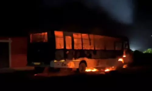 Mob asks CRPF soldiers to get down from bus, sets it on fire in Manipur Mob asks CRPF soldiers to get down from bus, sets it on fire in Manipur