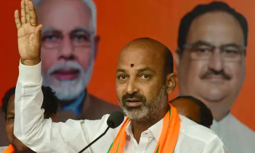 Union minister Bandi gets grand welcome in Karimnagar Union minister Bandi gets grand welcome in Karimnagar