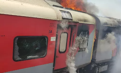 Two train coaches catch fire mysteriously near SCR office in Mettuguda