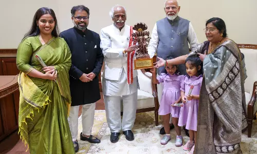 Haryana Governor along with family calls on PM