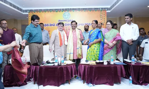 Minister Konda Surekha distributes cheques to temple committees for Bonalu celebrations