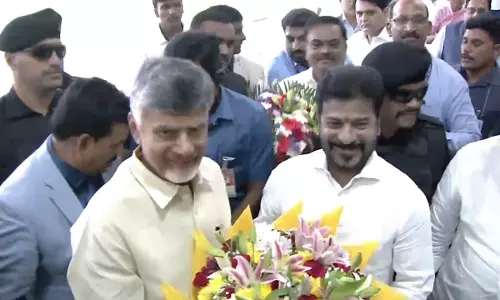 Telangana CM Revanth Reddy meets AP CM Naidu at Praja Bhavan