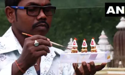 Odisha miniature artist crafts eco-friendly two-inch chariot on the commencement of Jagannath Rath Yatra Odisha miniature artist crafts eco-friendly two-inch chariot on the commencement of Jagannath Rath Yatra