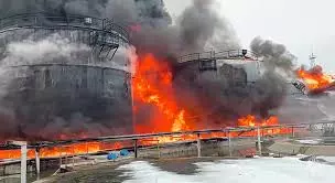 Fire at a Russian oil depot as Russia and Ukraine exchange drone attacks