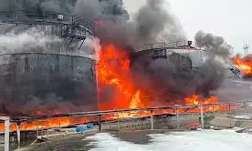 Fire at a Russian oil depot as Russia and Ukraine exchange drone attacks