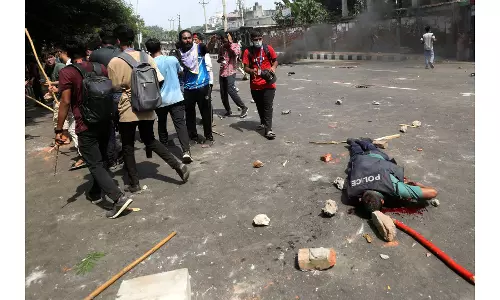 Bangladesh student protesters storm prison, free hundreds of inmates