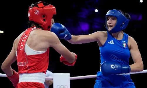 Imene Khelif, Algeria boxer who had gender test issue, wins first Olympic fight when opponent quits