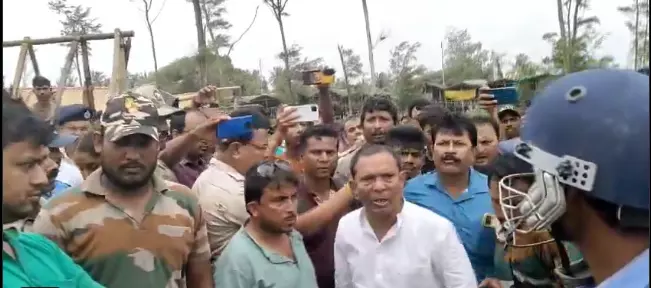 TMC forces minister to resign for abusing lady forest officer TMC forces minister to resign for abusing lady forest officer