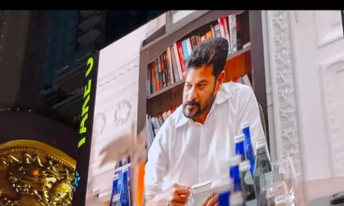 Fans Celebrate Revanth Reddys Successful First Day in New York