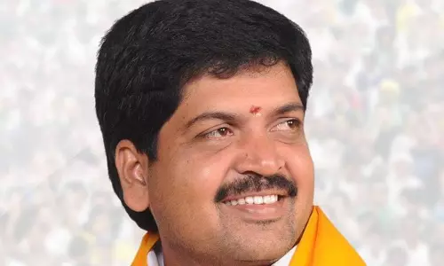 Ravindra distributes pensions at Eedepalli