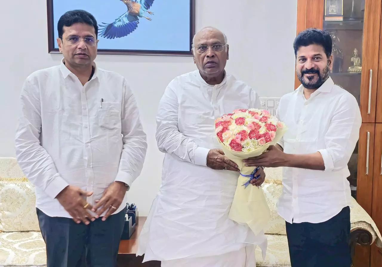 Telangana CM Revanth briefs Kharge on loan waiver Telangana CM Revanth briefs Kharge on loan waiver