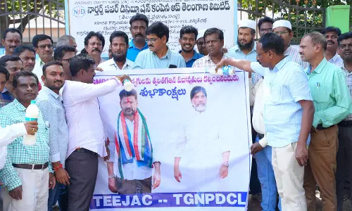 TGNPDCL Staff Honour CM, Dy CM With Milk Bath on Promotions