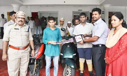 AP CM Naidu Helps Two Men With Electric Scooters