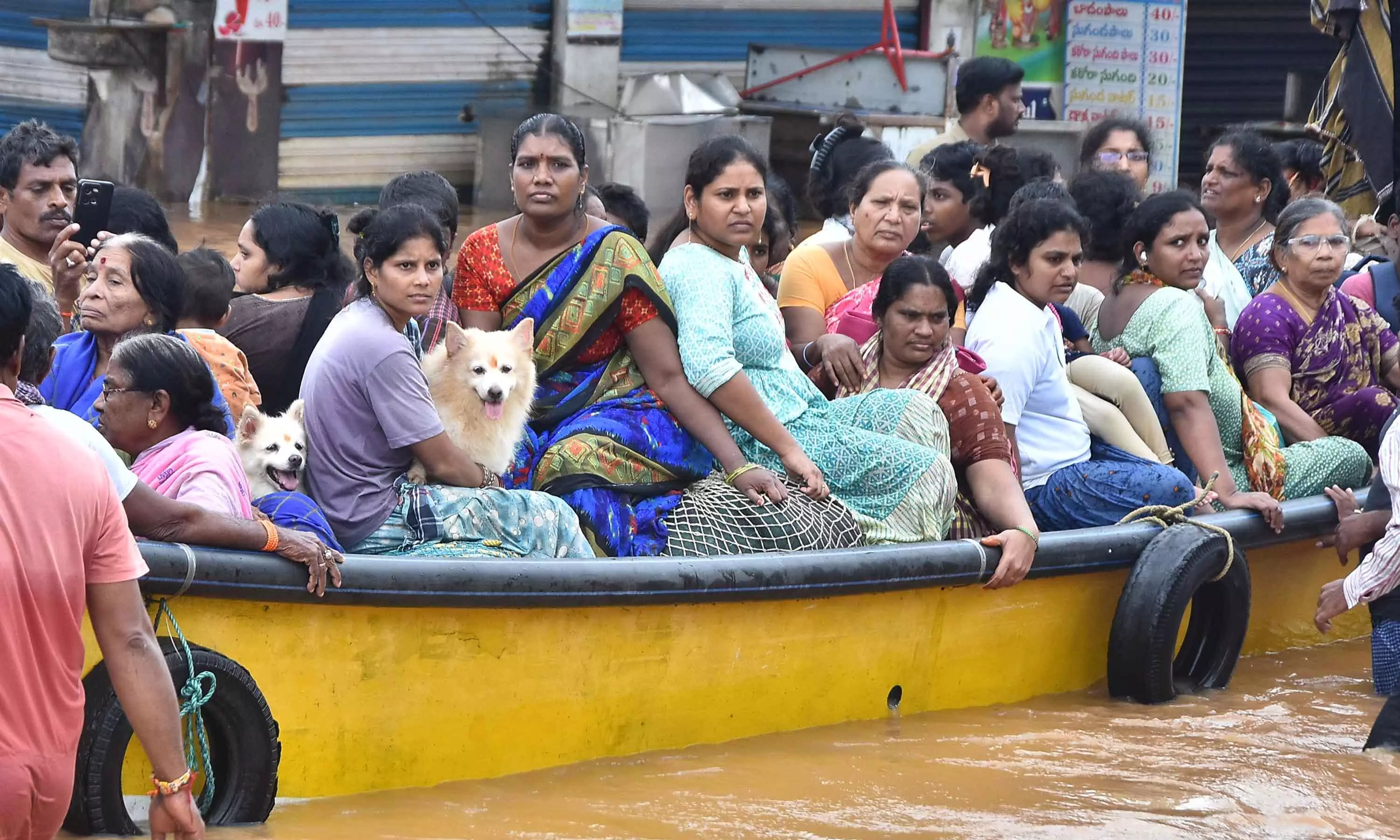 AP Floods: 14,452 Evacuated by NDRF and APSDRF in Vijayawada AP Floods: 14,452 Evacuated by NDRF and APSDRF in Vijayawada