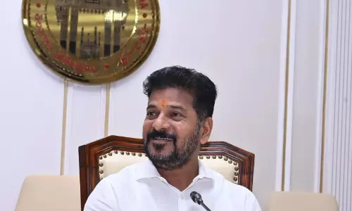 Revanth Discusses Party Issues with KC in Delhi