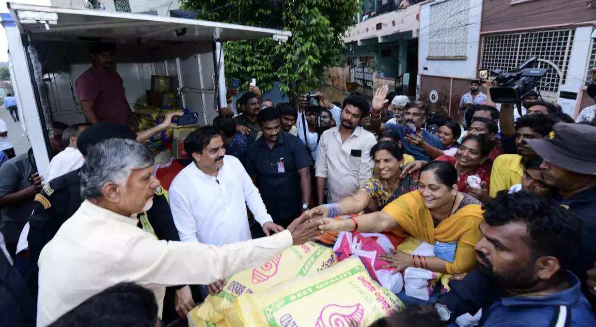 AP Government Distributes Free Ration Kits to Flood Victims in Vijayawada AP Government Distributes Free Ration Kits to Flood Victims in Vijayawada