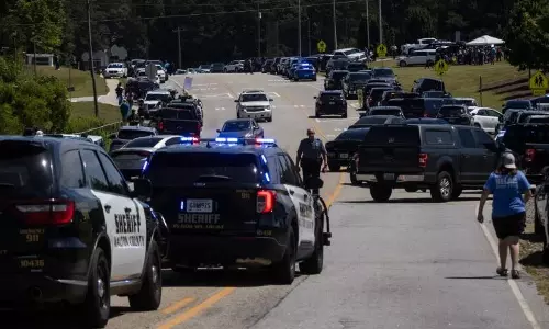 14-year-old boy charged with killing four in US school shooting