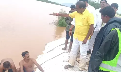 Vijayawada: Budameru breach successfully closed Vijayawada: Budameru breach successfully closed