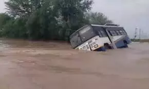 RTC bus trapped in stream in Prakasam RTC bus trapped in stream in Prakasam