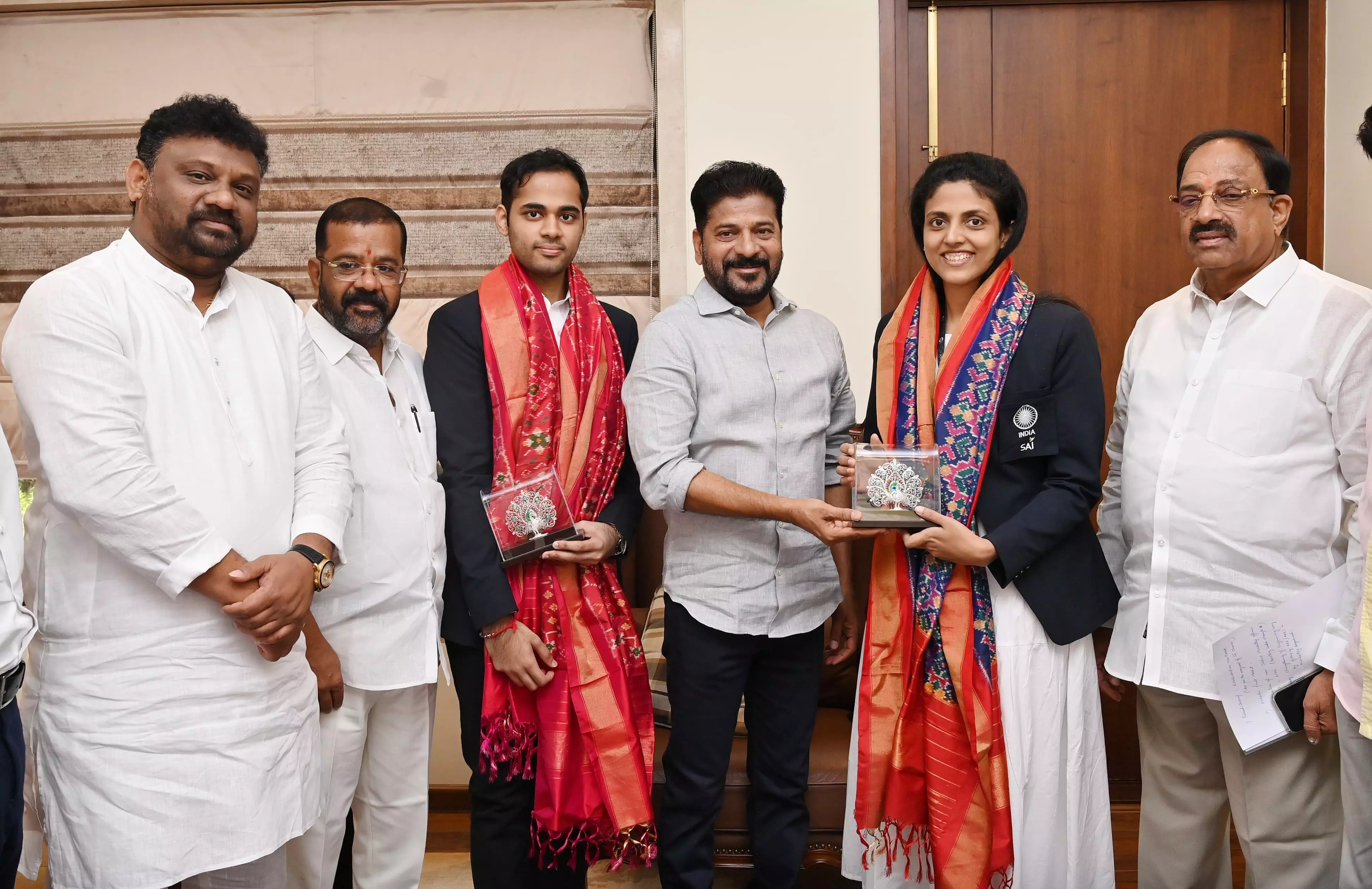 Revanth Reddy Announces Rs 25 Lakhs each for chess players Arjun, Harika
