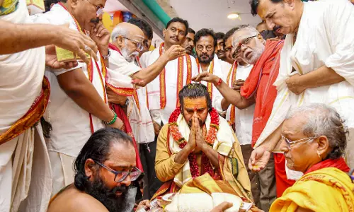 Sanjaya Baru | Pride & politics: Netas toss the Tirupati laddu around Sanjaya Baru | Pride & politics: Netas toss the Tirupati laddu around