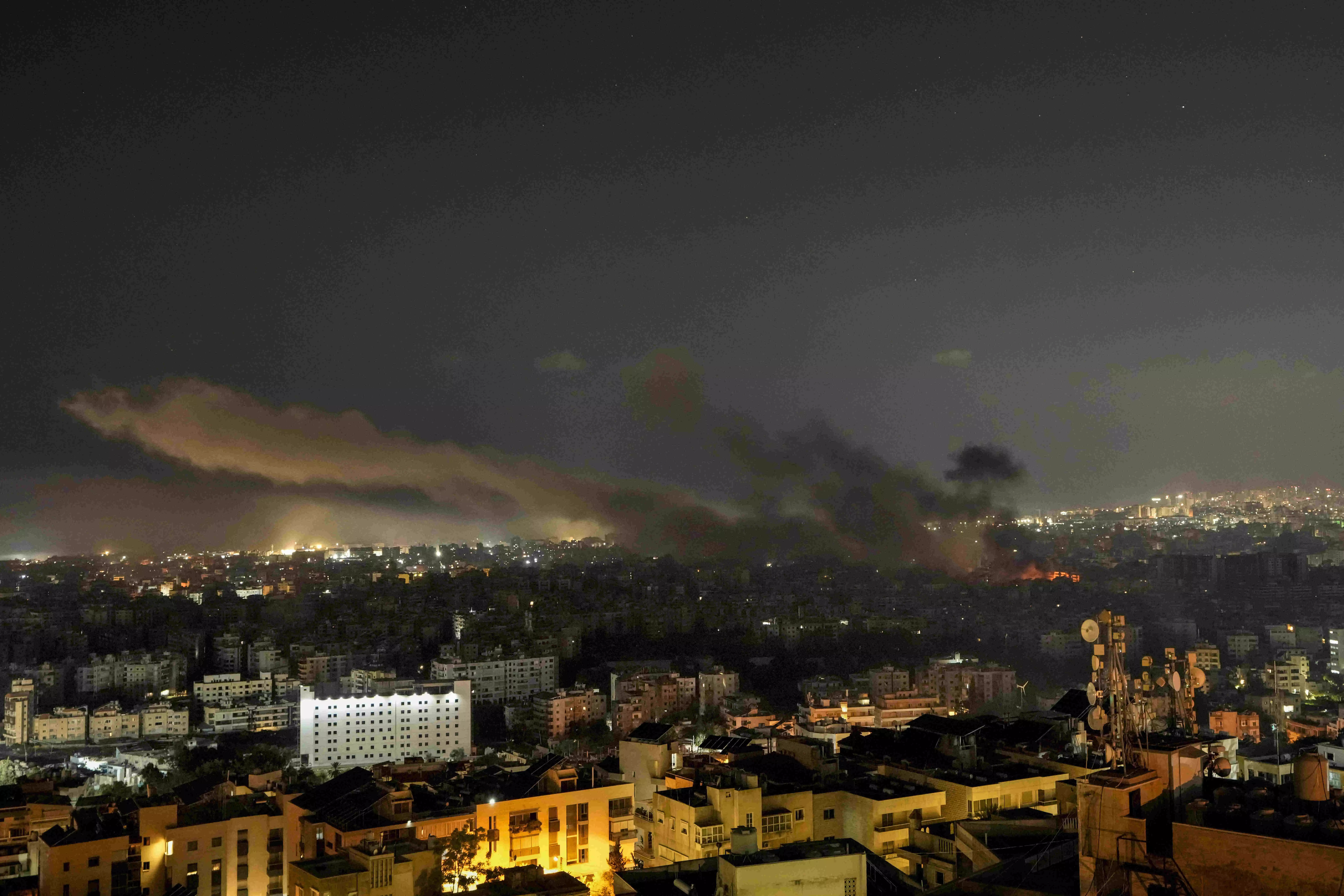 Israeli airstrikes rock suburbs of Beirut and cut off a key crossing into Syria Israeli airstrikes rock suburbs of Beirut and cut off a key crossing into Syria