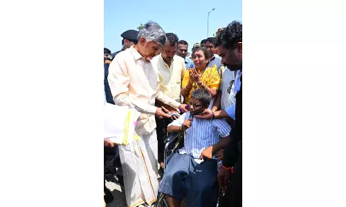 Naidu meets ailing fan at Renigunta airport, extends financial aid