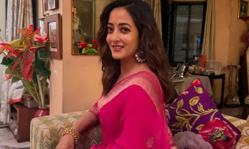 Raima Sen Radiates Elegance in Pink Banarasi Sari During Durga Puja Celebrations